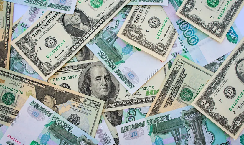 US dollar banknotes and Russian ruble banknotes