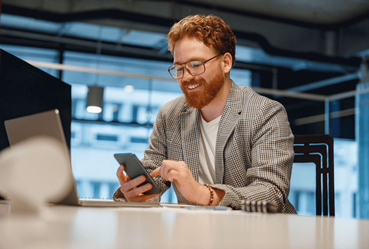 man scrolling on phone