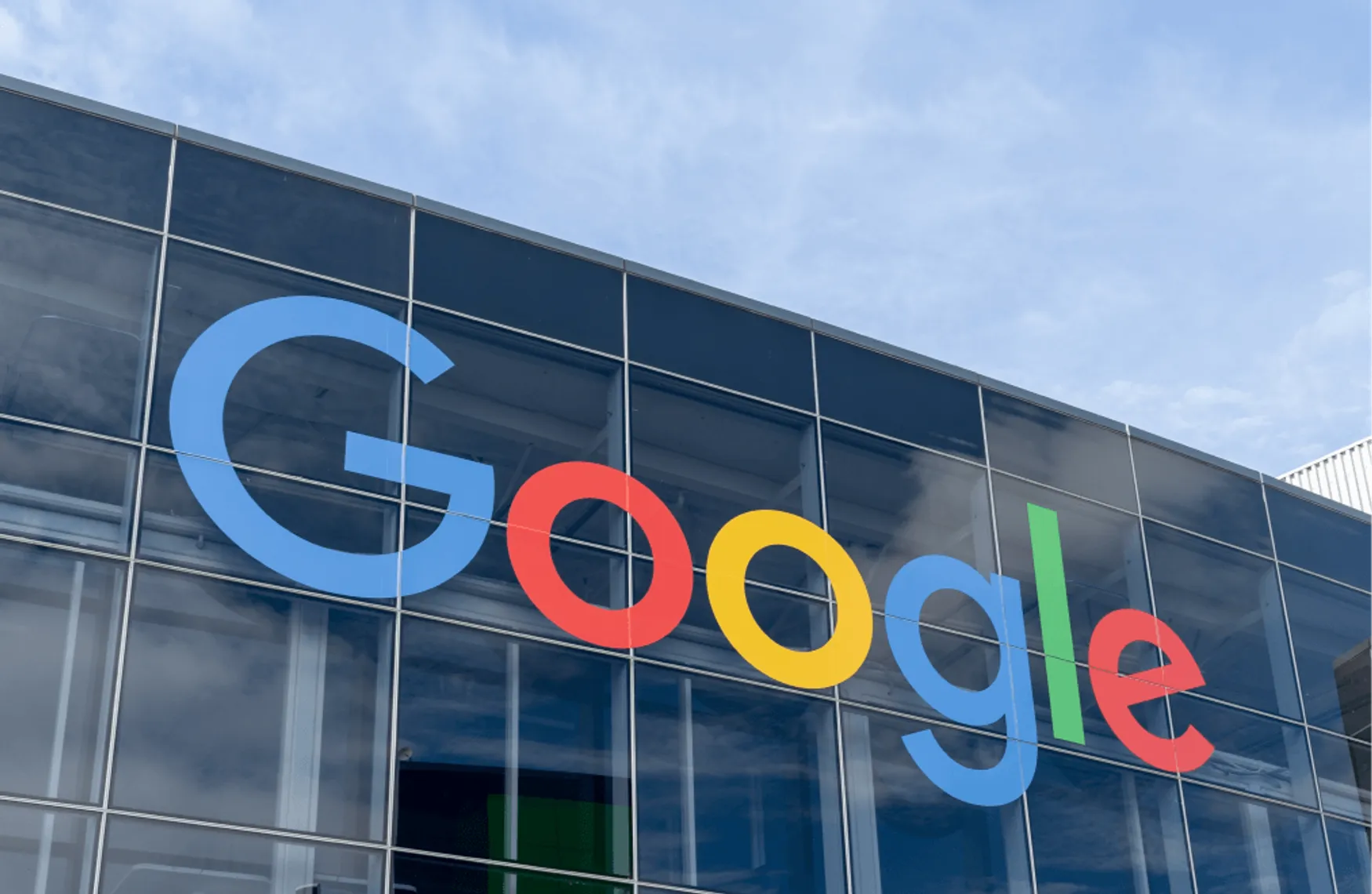 Front of google office with a google sign