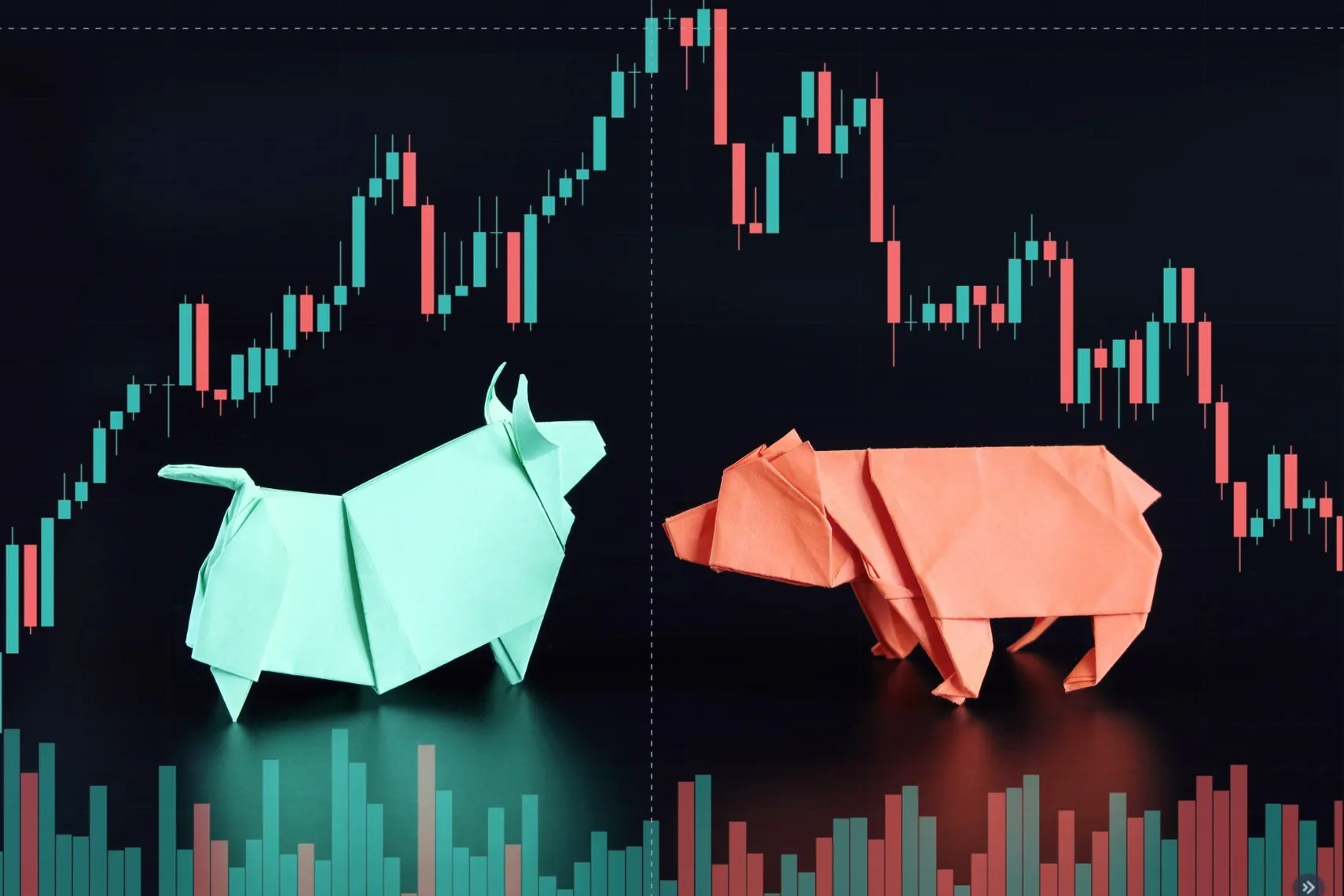 Origami bull and bear figures placed in front of a candlestick stock chart, representing the contrast between bullish and bearish market trends. Bull and bear market origami with stock chart (Source: Shutterstock)