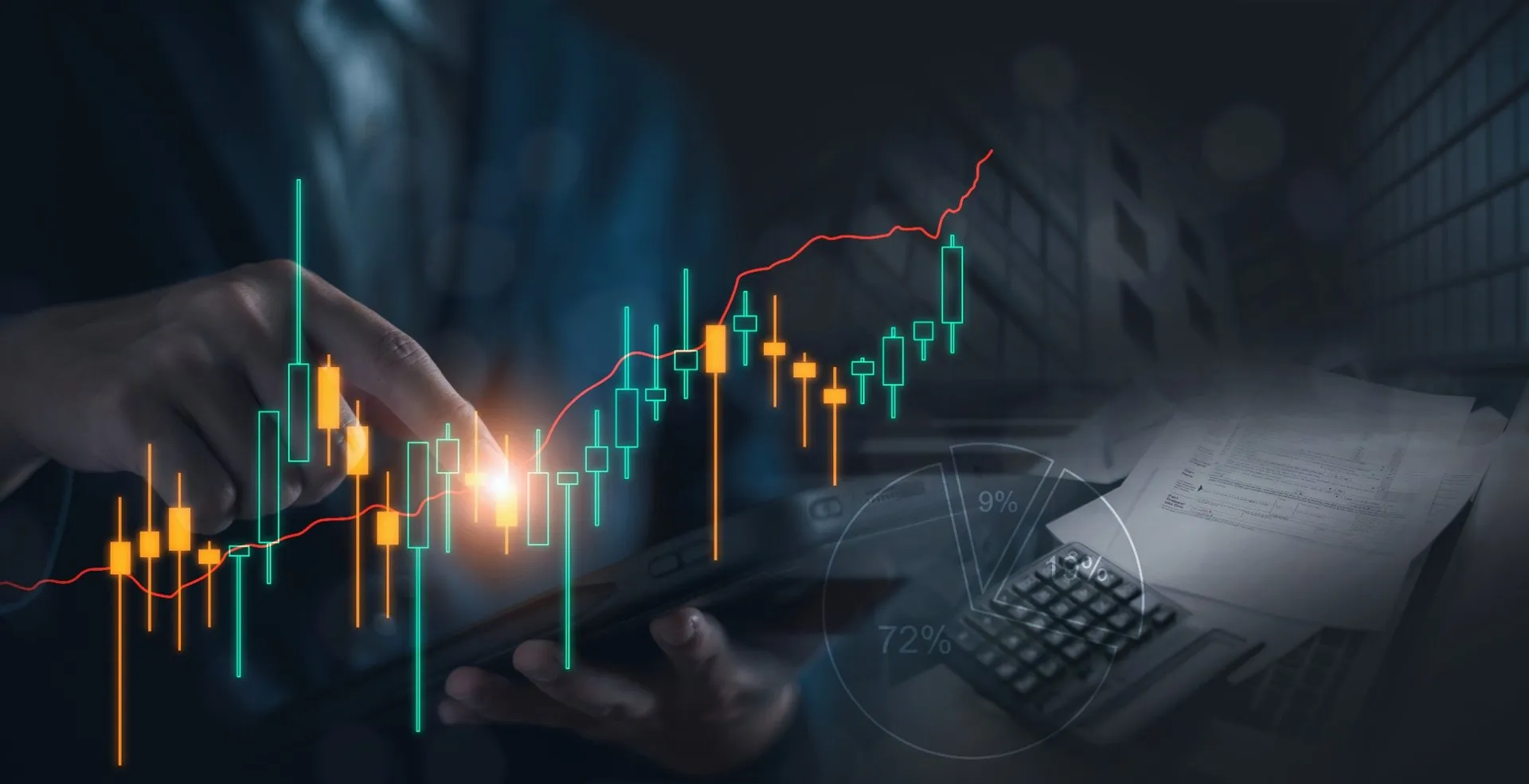 Digital trading chart on tablet with financial analytics (Source: Shutterstock) Hand interacting with a tablet displaying a rising candlestick chart and financial analytics, representing digital trading, investment analysis, and market performance.