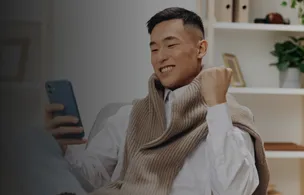 Man on phone trading