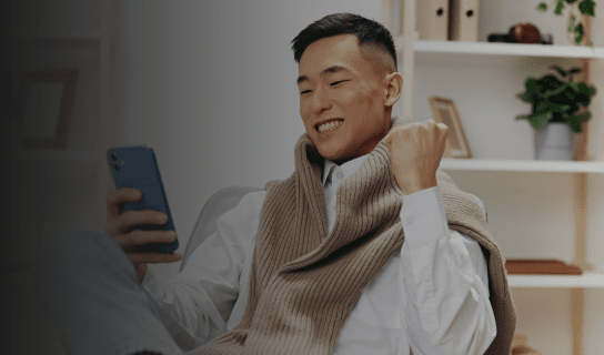 Man on phone trading