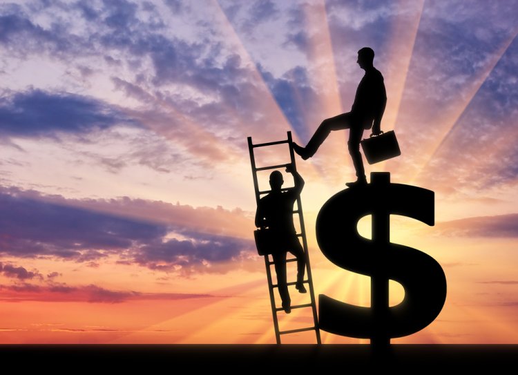 Elliott assumed these movements to be driven by human emotion, such as fear and greed Business man on a ladder