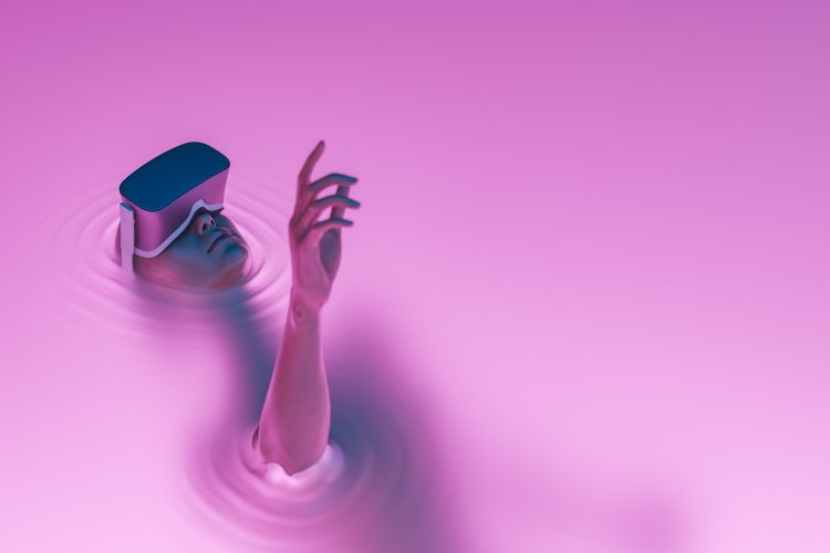 Metaverse Person with a VR headset, pointing, on a pink background