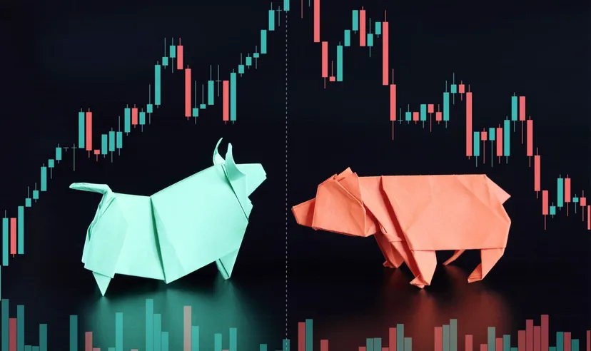 Bull and bear market origami with stock chart (Source: Shutterstock)